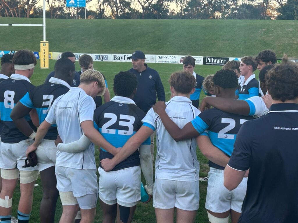 jonny mallett giving the team a half time pep talk